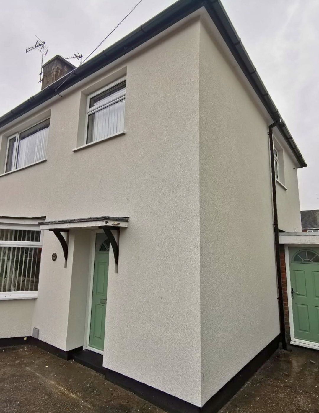 Bedford house after 90mm EPS insulation boards and white Kabe render topcoat.