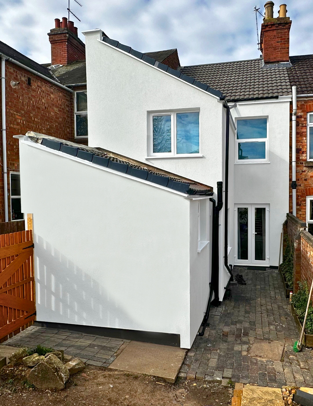 Coventry house after 100mm EPS insulation boards and Kabe silicone render.