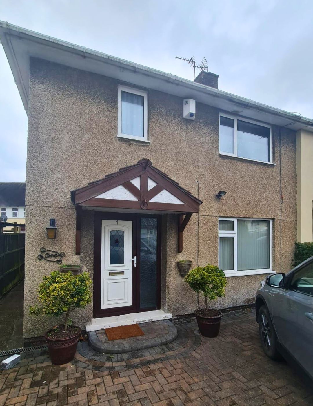 Bedworth semi-detached with tired weathered pebbledash render before renovation by PD Rendering