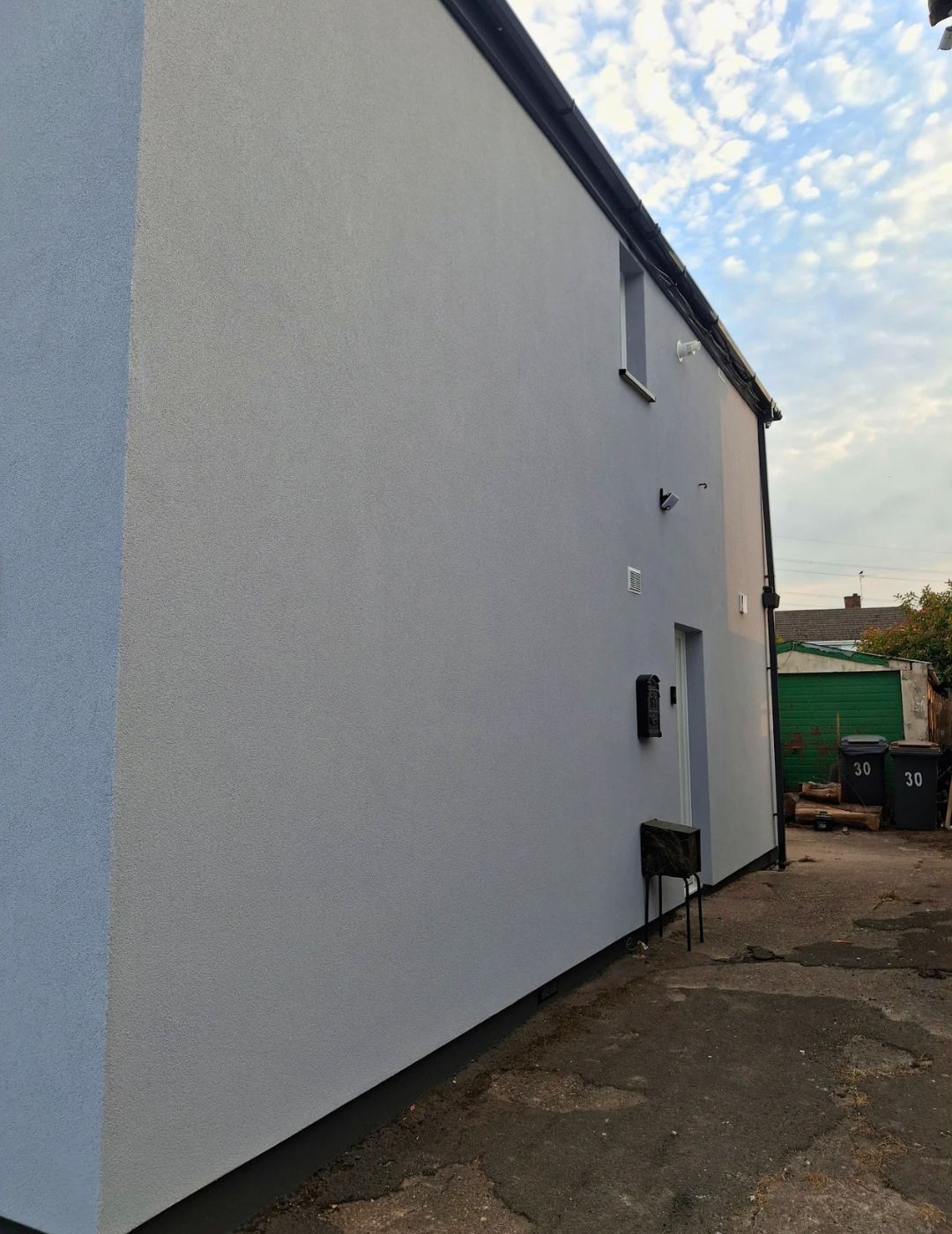 Derby side elevation finished in light grey algae-resistant silicone render by PD Rendering