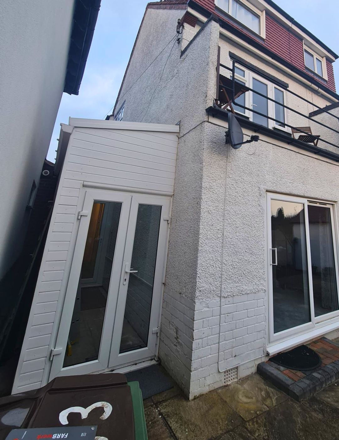 Semi-detached house in Nottingham with weathered pebbledash render before transformation by PD Rendering