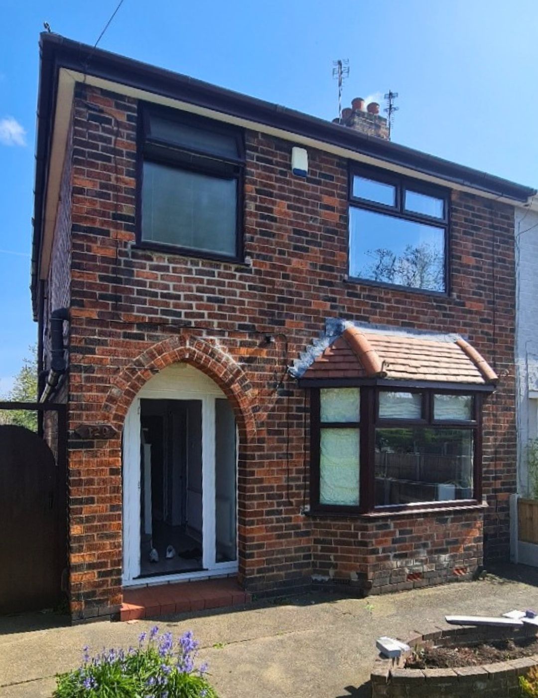 Semi-detached red brick house in Wolverhampton before silicone render transformation by PD Rendering