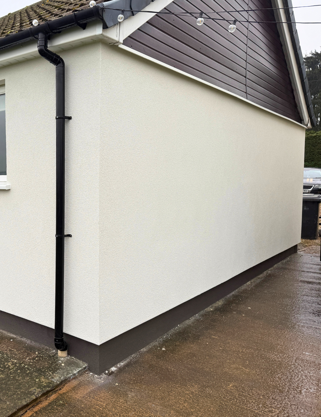 Pristine smooth white silicone render on a London property facade completed by PD Rendering.